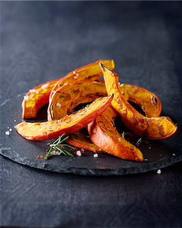 pumpkin roast - Roasted pumpkin with rosemary Stock Photo - Rights-Managed, Code: 825-07652806