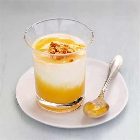 simsearch:652-07656381,k - Yoghurt cream dessert with lemon curd Stock Photo - Rights-Managed, Code: 825-07652835