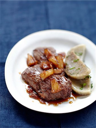 Sweet and salty grilled sirloin steak,artichoke bases with parsley Stock Photo - Rights-Managed, Code: 825-07652867