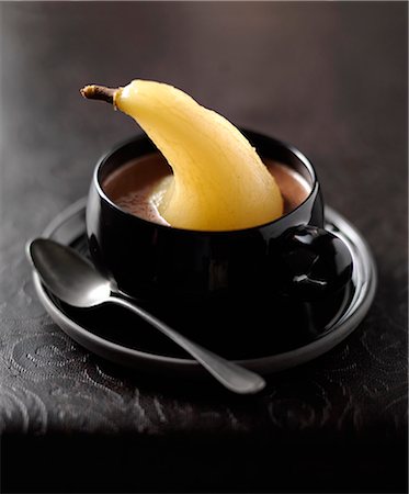 simsearch:652-07656312,k - Chocolate soup with a poached pear Photographie de stock - Rights-Managed, Code: 825-07652901