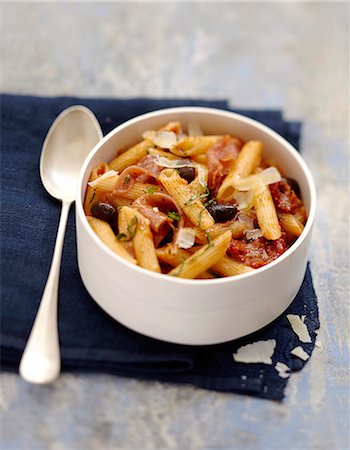 simsearch:652-07655956,k - Penne with black olives,raw ham and sun-dried tomatoes Stock Photo - Rights-Managed, Code: 825-07652930