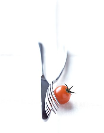 simsearch:825-02302544,k - cherry tomato, knife and fork Stock Photo - Rights-Managed, Code: 825-02304040