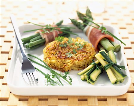 Potato Paillasson and bundles of vegetables Stock Photo - Rights-Managed, Code: 825-02304091