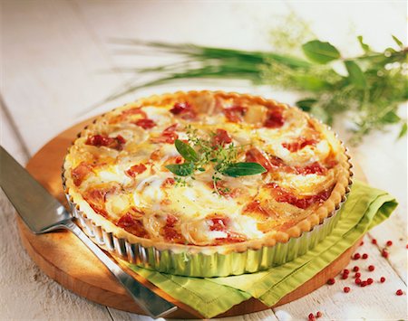 Goat's cheese and smoked ham savoury tart Stock Photo - Rights-Managed, Code: 825-02304268