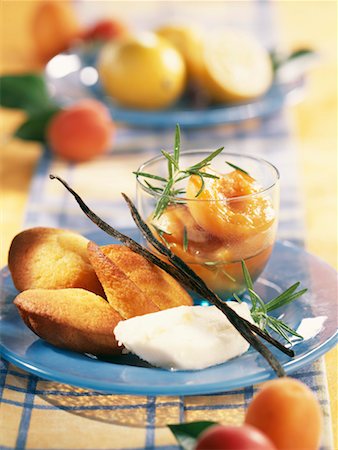 simsearch:825-02304110,k - Lemon madeleines with lemon sorbet and apricots poached with rosemary Stock Photo - Rights-Managed, Code: 825-02304331