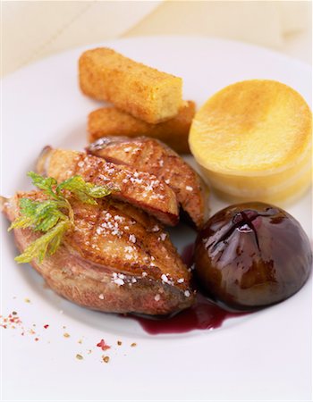 simsearch:825-02304591,k - Duck fillets with fig ,polenta and potato croquette Stock Photo - Rights-Managed, Code: 825-02304546