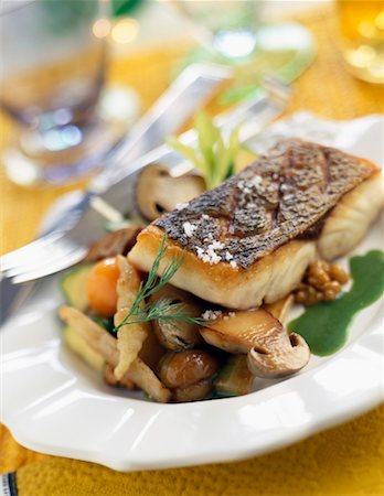Piece of bass with old-fashioned vegetables Stock Photo - Rights-Managed, Code: 825-02304559