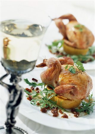 Stuffed quail on apple and currants Stock Photo - Rights-Managed, Code: 825-02304826