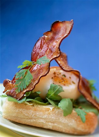 poached egg - Poached egg and bacon on bread Stock Photo - Rights-Managed, Code: 825-02304832