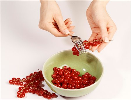 simsearch:825-02302544,k - taking redcurrants off the stems with a fork Stock Photo - Rights-Managed, Code: 825-02305078