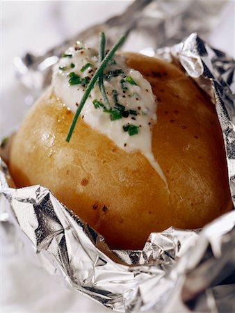 Oven baked patatoes Foto de stock - Con derechos protegidos, Código: 825-02306692