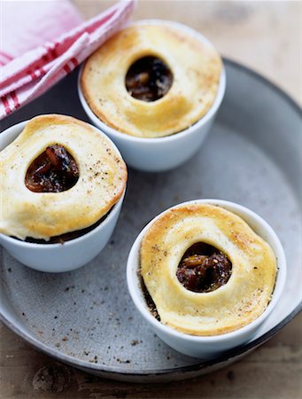 ramekin - Meat and dried fruit pies Stock Photo - Rights-Managed, Code: 825-02307037