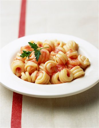 Riccioli pasta with tomato sauce Stock Photo - Rights-Managed, Code: 825-02307041