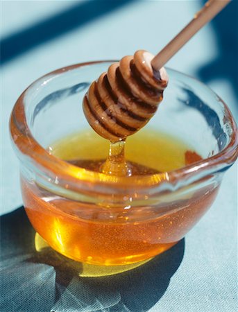ramekin - Pot of honey with honey spoon Stock Photo - Rights-Managed, Code: 825-02307203