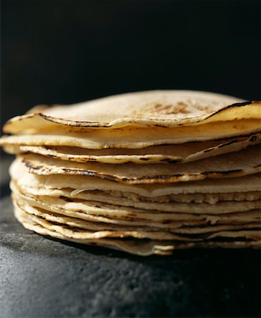 quesadilla - Haufen von Mais galettes Stockbilder - Lizenzpflichtiges, Bildnummer: 825-02307264