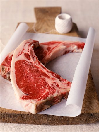 Raw beef chops Fotografie stock - Rights-Managed, Codice: 825-02307319