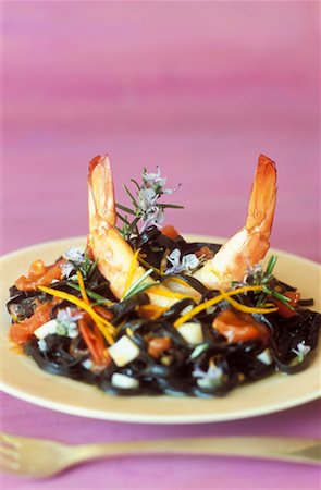 Tagliatelle with cuttlefish ink and prawns Stock Photo - Rights-Managed, Code: 825-02307950