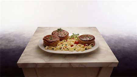 Steaks and tagliatelles Stock Photo - Rights-Managed, Code: 825-02302718