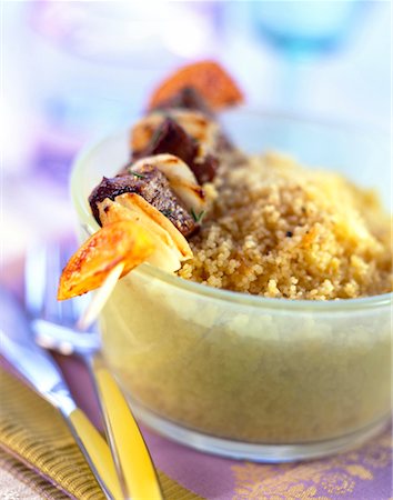 lamb skewer and orange-flavored couscous Stock Photo - Rights-Managed, Code: 825-02303080