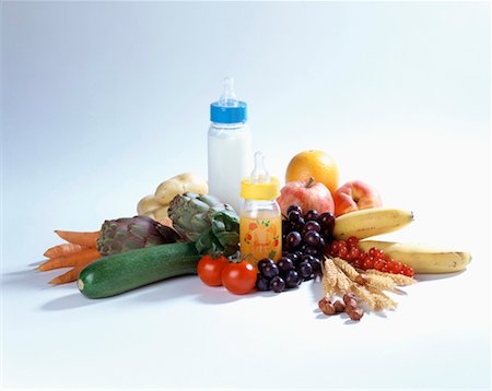 assorted fruit and vegetables with baby bottles Stock Photo - Rights-Managed, Code: 825-02303635