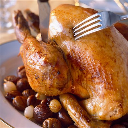 pavo (alimento) - Roast turkey with chestnuts Foto de stock - Con derechos protegidos, Código: 825-03627006