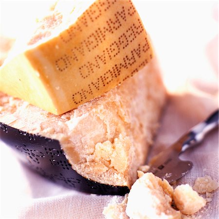 parmigiano reggiano - Pieces of Parmesan cheese Stock Photo - Rights-Managed, Code: 825-03627089