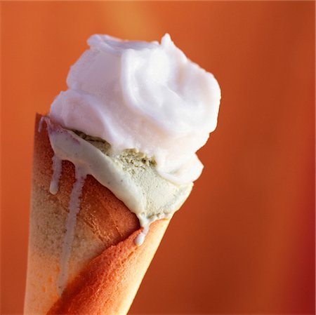 Lemon and pistachio ice cream in cone Stock Photo - Rights-Managed, Code: 825-03627142