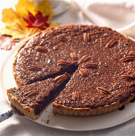 pastel de pacana - Pecan tart Foto de stock - Con derechos protegidos, Código: 825-03627202