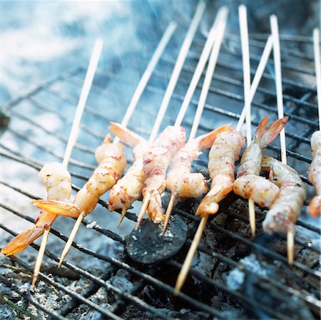 Prawn kebabs on barbecue Foto de stock - Con derechos protegidos, Código: 825-03627316