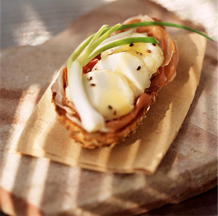 Hot goat's cheese and Parma ham open sandwich Stock Photo - Rights-Managed, Code: 825-03627403