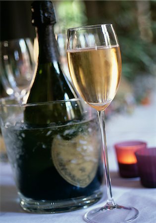 Glass and bottle of champagne Stock Photo - Rights-Managed, Code: 825-03627616