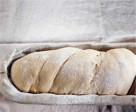 Bread rising in bread basket before baking Fotografie stock - Rights-Managed, Codice: 825-03628185