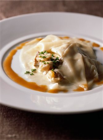 Giant raviolis with frog's legs Stock Photo - Rights-Managed, Code: 825-03628461