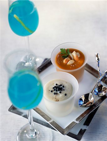 simsearch:652-03802621,k - Cream of cauliflower with caviar and lobster bisque with petoncle scallops Foto de stock - Con derechos protegidos, Código: 825-03628624