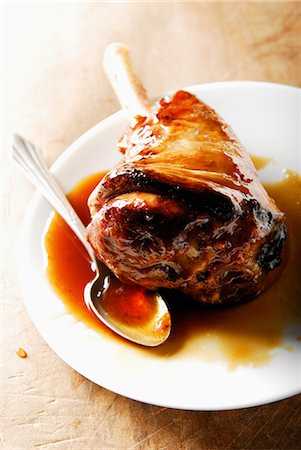 Lamb knuckle joint caramelized with honey, sweet and sour sauce Stock Photo - Rights-Managed, Code: 825-03628677