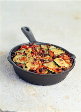 Beef,zucchini and tomato gratin Stock Photo - Rights-Managed, Code: 825-03628978