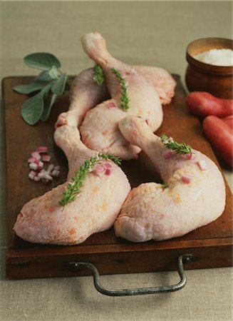 raw chicken on cutting board - Raw chicken legs Stock Photo - Rights-Managed, Code: 825-03629370