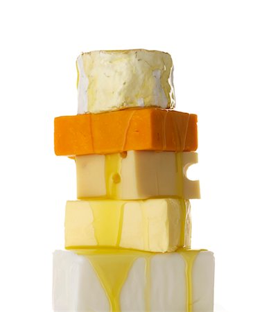 simsearch:825-03628817,k - Pouring oil over a stack of cheese Fotografie stock - Rights-Managed, Codice: 825-03629399