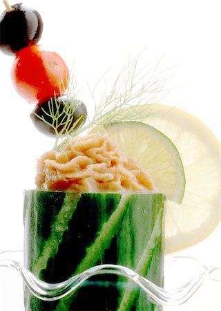 Cucumber stuffed with vegetable mousse and a tomato and olive skewer Stock Photo - Rights-Managed, Code: 825-03629485