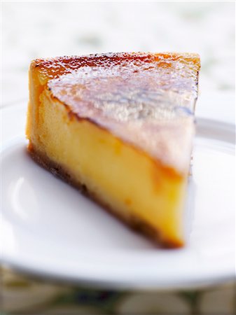 flan - Portion of baked egg custard Stock Photo - Rights-Managed, Code: 825-03629531