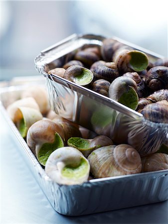 simsearch:825-03627991,k - Aluminium containers of snails with parsley butter Stock Photo - Rights-Managed, Code: 825-03629541