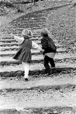 Girl And Boy Holding Hands Black And White Stock Photos Page 1 Masterfile