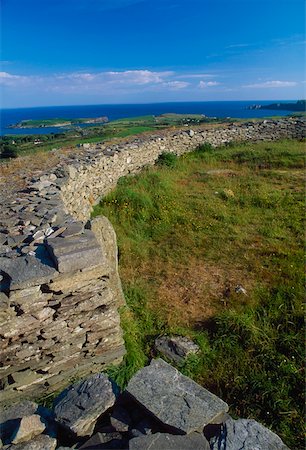 Knockdrum Ring Fort, Castletownend, County Cork, Ireland; Stone wall of historic fort Stock Photo - Rights-Managed, Code: 832-02255315