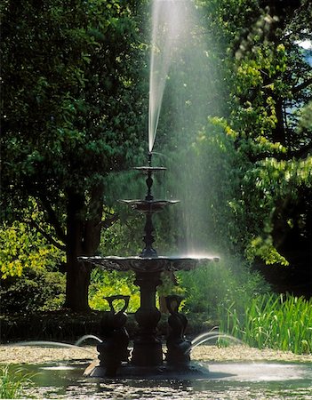 Dolphin Fountain in thewild garden, Powerscourt House & Gardens, Co Wicklow, Ireland Stock Photo - Rights-Managed, Code: 832-02252552