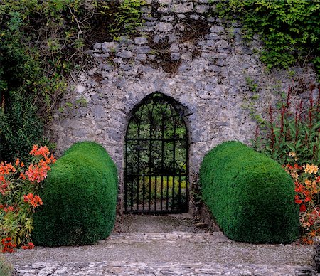 flowers and entrance and nobody - Gothic Entrance Gate, Walled Garden, Ardsallagh, Co Tipperary, Ireland Stock Photo - Rights-Managed, Code: 832-02252560