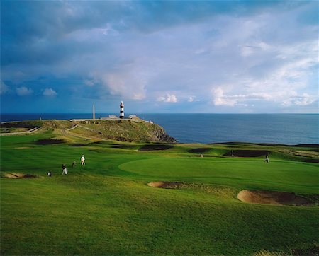 Co Cork, Ireland; Golf course with the Old Head of Kinsale in the background Stock Photo - Rights-Managed, Code: 832-03232489