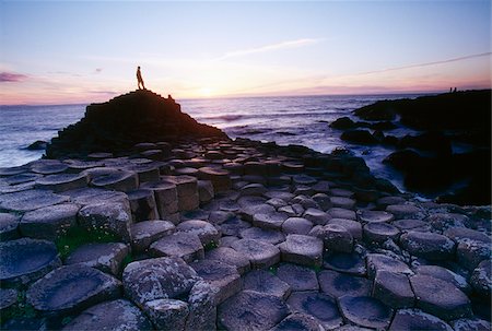 simsearch:832-03639296,k - The Giant's Causeway, County Antrim, Ireland; Distant silhouette of person on volcanic rock formation Stock Photo - Rights-Managed, Code: 832-03232921