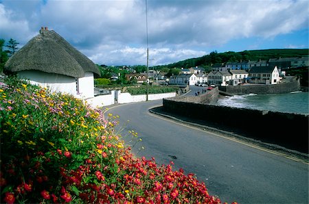 flower garden pictures in ireland - Dunmore East, County Waterford, Ireland; Thatched cottage by the sea Stock Photo - Rights-Managed, Code: 832-03233015