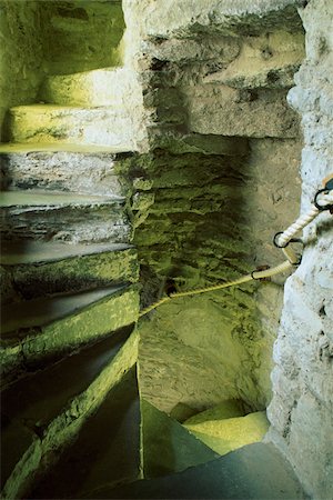 Kings John's Castle, County Limerick, Ireland; Stone spiral staircase in castle Fotografie stock - Rights-Managed, Codice: 832-03233098