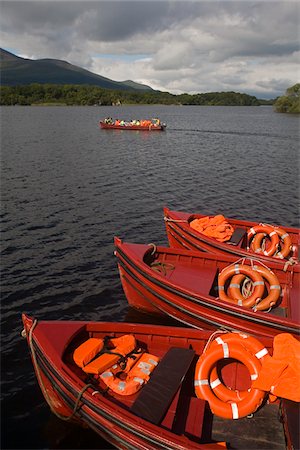 Lough Leane, Killarney National Park, County Kerry, Ireland; Tour boats Fotografie stock - Rights-Managed, Codice: 832-03233202